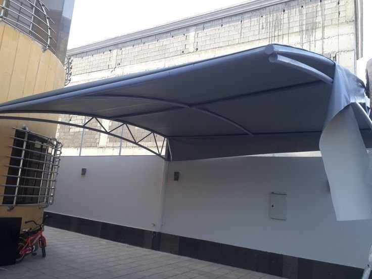 مظلات سيارات قوسية